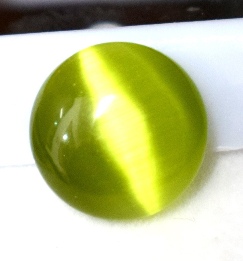 Green cats eye stone price sale