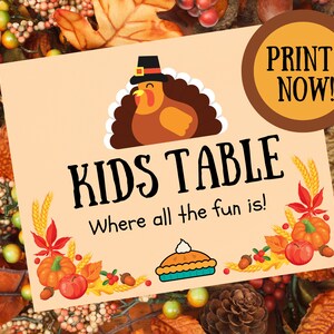 sign says kids table, where all the fun is on bed or autumn leaves sign has cartoon turkey on it.  Print now in the corner