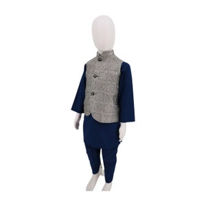 May include: A gray waistcoat with a geometric pattern and a navy blue long-sleeved shirt and pants.