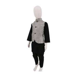 May include: A black kurta and matching pants with a silver patterned waistcoat. The waistcoat has a mandarin collar and a button closure.