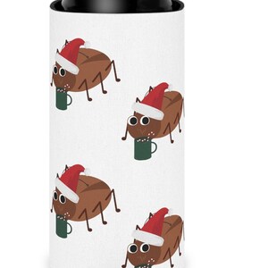 May include: White can cooler with a repeating pattern of brown cartoon bugs wearing red Santa hats and holding green mugs.
