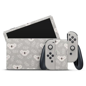 Adesivo de vinil premium para Nintendo Switch OLED, modelo Koala Kawaii, cinza.