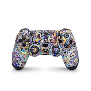 May include: A black PlayStation 4 controller with a colorful abstract design featuring swirls of yellow, blue, and purple. The design resembles a liquid marble pattern.