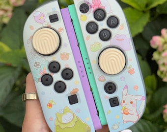 Nintendo Switch 2 JoyCon hoesje/cover/shell/skin van transparant TPU-siliconen, flexibel, in een schattige crème-blauwe collage-stijl met pastelkleuren.