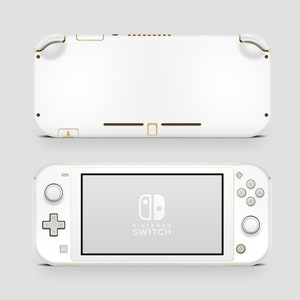 Pode incluir: Console de jogos portátil Nintendo Switch Lite branca com detalhes dourados. O console é mostrado nas vistas frontal e traseira.
