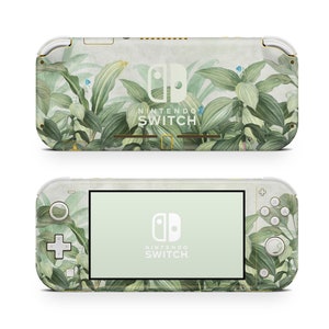 May include: A green and white Nintendo Switch Lite console with a floral design. The console has a green screen and the Nintendo Switch logo is visible on the front.