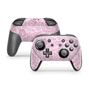 May include: A pink Nintendo Switch controller with a custom skin featuring a pattern of purple potion bottles, stars, and other magical symbols.