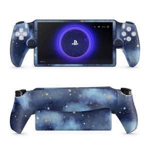 May include: A blue and gold PlayStation Portal handheld gaming console with a starry night sky design. The console has two controllers on either side of the screen. The screen displays a PlayStation logo and the time 22:22.