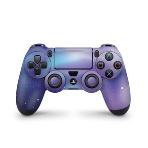 May include: A purple and blue galaxy-themed PlayStation 4 controller with a black faceplate and white buttons.