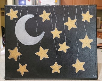 Hanging moon and stars painting