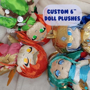 May include: Four custom 6-inch doll plushies with detailed facial features and colorful outfits. The dolls have various hair colors, including red, green, and blue. The text "CUSTOM 6" DOLL PLUSHES" is displayed in a blue bubble.