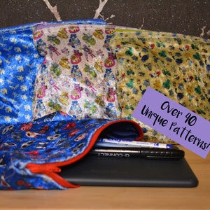 May include: Four velvet zipper pouches with different patterns. The pouches are blue, white, and gold with various designs. A purple tag reads "Over 40 Unique Patterns!"