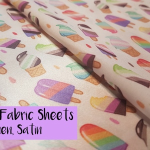 Könnte beinhalten: A4 Stoffbahnen aus Leinen und Satin mit einem bunten Eis am Stiel-Druck. Die Stoffbahnen sind weiß mit einem sich wiederholenden Muster aus Eis am Stiel in verschiedenen Farben und Designs.