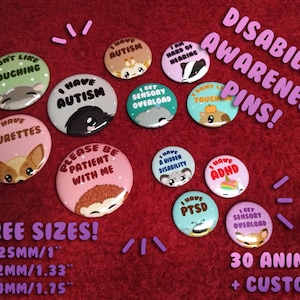 May include: A collection of round disability awareness pins featuring various animal illustrations and text including I HAVE AUTISM, I DON'T LIKE TOUCHING, I HAVE TOURETTES, I GET SENSORY OVERLOAD, I HAVE A HIDDEN DISABILITY, I HAVE ADHD, and I HAVE PTSD.