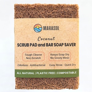 May include: A brown coconut scrub pad and bar soap saver. The packaging is brown with the text "MARASOL Coconut SCRUB PAD and BAR SOAP SAVER" and features the benefits of the product: "Tough Cleaner Non-Scratch Odorless - Antibacterial Keeps Soap Dry No Gooey Mess Easy Rinse - Quick Dry ALL NATURAL | PLASTIC FREE | COMPOSTABLE".