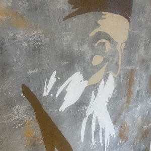 May include: A gray, textured background with a white silhouette of a person's face and beard. The person is wearing a brown hat. The silhouette is painted in a brushstroke style.