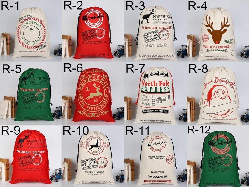 May include: Twelve different Christmas gift bags with various designs. The bags are made of natural canvas fabric and feature red, green, and white colors. Some bags have reindeer, Santa Claus, and other Christmas-themed illustrations. The bags have a drawstring closure.