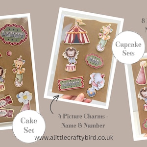 May include: A set of circus-themed paper charms featuring a red and white striped tent, a lion, an elephant, popcorn, tickets, and a name plaque labelled Lenny. The collection includes text reading 8 Picture Charms, Name & Number, and Cake Set.