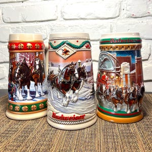 Vtg. (set of 3) 1993-96 & 97 Budweiser Holiday Stein Collection