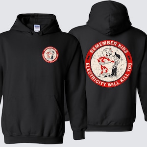 May include: Black hooded sweatshirt with a front and back graphic. The front graphic is a circular design with the text "REMEMBER KIDS ELECTRICITY WILL KILL YOU" and a cartoon image. The back graphic is a larger version of the same design.