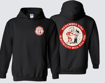 May include: Black hooded sweatshirt with a front and back graphic. The front graphic is a circular design with the text "REMEMBER KIDS ELECTRICITY WILL KILL YOU" and a cartoon image. The back graphic is a larger version of the same design.