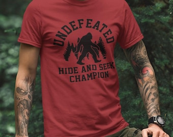 Bigfoot Hide And Seek Champion Shirt, Undefeated Sasquatch Tee, Funny Camping Shirt, Outdoor Adventure Graphic Tee, Cryptid Humor Gift