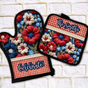 May include: A matching oven mitt and pot holder set. The mitt features a blue floral design with red, white, and blue flowers, and the word "Celebrate!". The pot holder has the text "The Smiths" and a similar floral pattern.