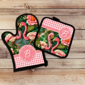May include: Pink flamingo oven mitts and hot pad set with a pink and white gingham pattern and a monogrammed "B" in a circle.