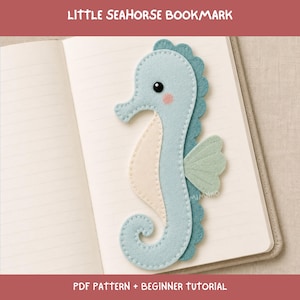 May include: A light blue felt seahorse bookmark with a cream-coloured belly, a scalloped dark blue fin, and a small light green side fin. The seahorse has a black eye and a pink cheek. The text LITTLE SEAHORSE BOOKMARK and PDF PATTERN + BEGINNER TUTORIAL is visible.