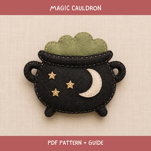 May include: A black felt craft project shaped like a cauldron with a green felt bubbly top. The cauldron features three small beige star-shaped buttons and a beige crescent moon applique. The text MAGIC CAULDRON PDF PATTERN + GUIDE is visible.