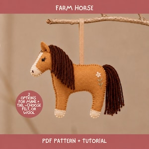 May include: A tan felt horse ornament with a dark brown yarn mane and tail, featuring a white blaze on its face, white hooves, and a small embroidered flower on its flank. A beige ribbon loop is attached to the top. Text reads FARM HORSE and 2 OPTIONS FOR MANE + TAIL - CHOOSE FELT, OR WOOL and PDF PATTERN + TUTORIAL.