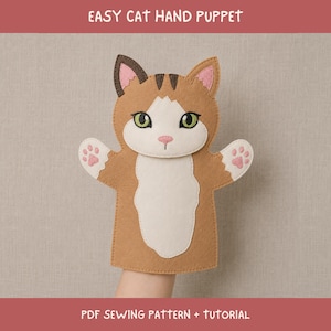 May include: A brown and white felt cat hand puppet with green eyes, a pink nose, and pink paw prints on the paws. The text EASY CAT HAND PUPPET and PDF SEWING PATTERN + TUTORIAL is visible at the top and bottom of the image respectively.