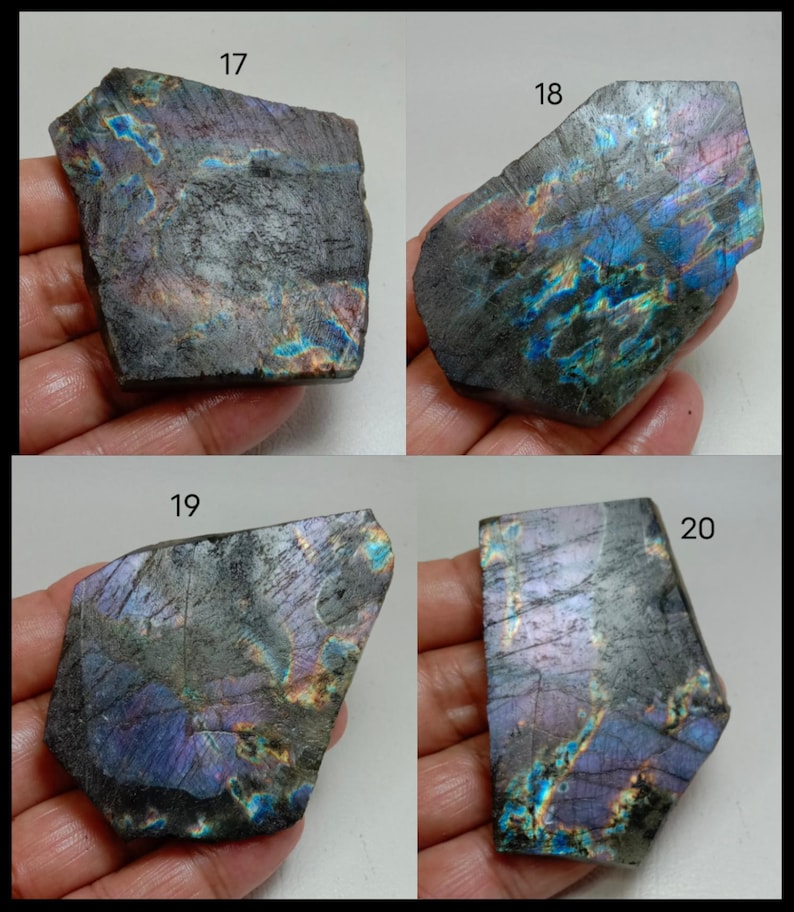 May include: Four pieces of raw labradorite gemstone, each with a unique shape and iridescent play of color. The stones display hues of blue, purple, and gold, with a rough, textured surface. Numbers 17, 18, 19, and 20 are visible on the stones.