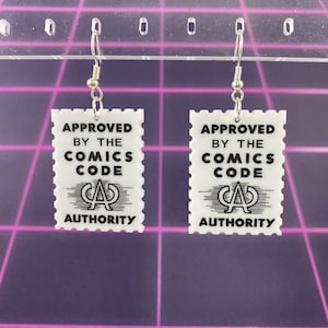 Boucles d&#39;oreilles pendantes estampées du code de la bande dessinée