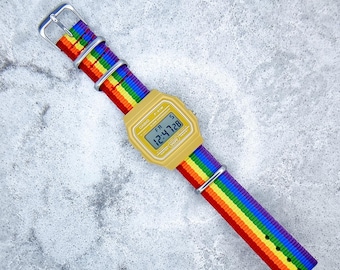 Casio Digital Watch Yellow Edition on a Rainbow Nylon strap, F91WC-4A2EF