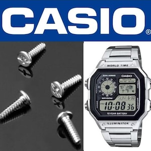 May include: A Casio digital watch with a silver band and a black face displaying the time, date, and world time features. Also, four silver screws are visible, with the Casio logo in the background.