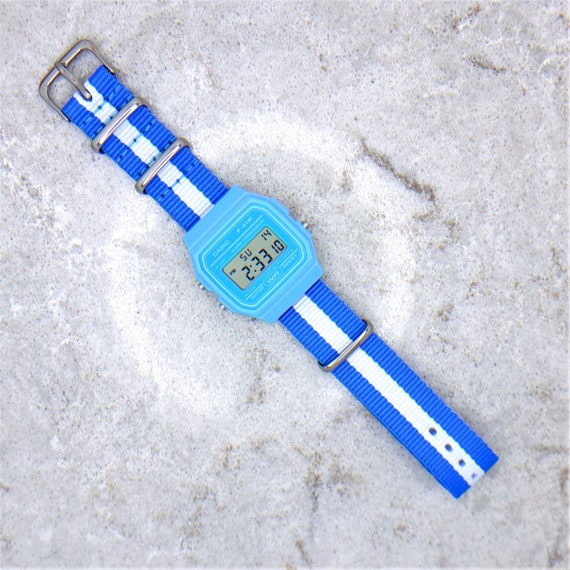 Orologio Casio F-91 blu: cinturino in nylon con bandiera argentina