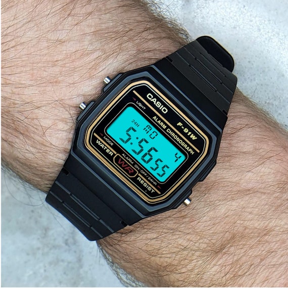 Casio Watch gold Detail With Turquoise Screen Mod F-91W, the Liberty 