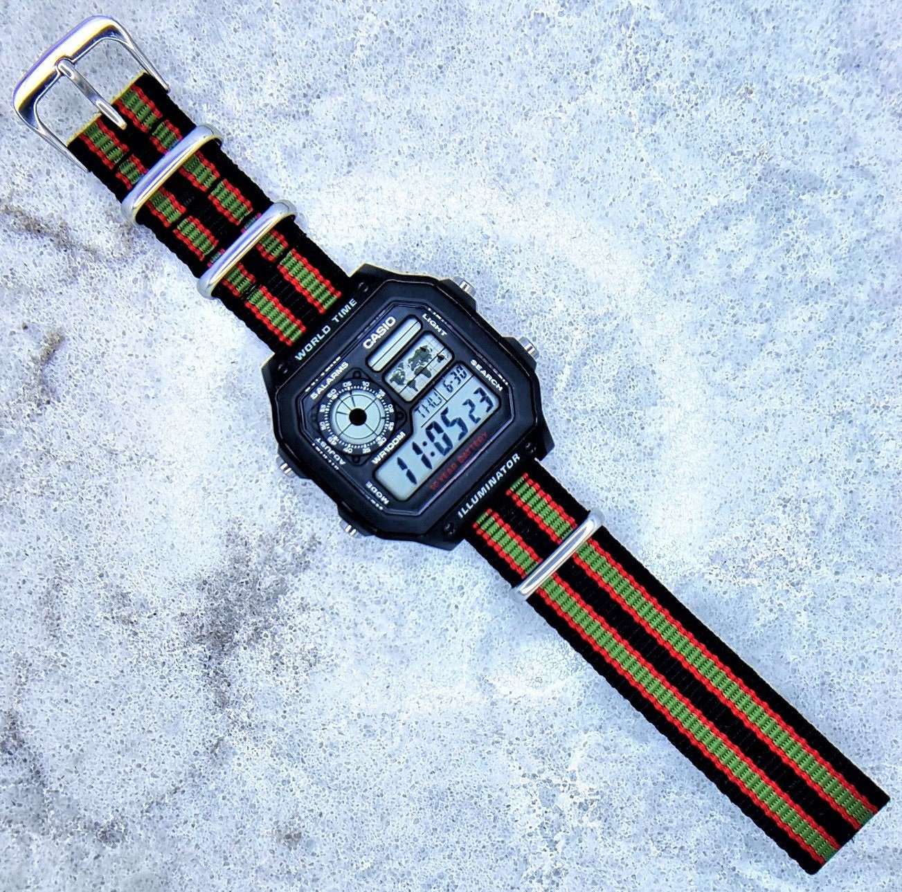 Casio World Time Illuminator Watch With James Bond Ballistic Nylon Strap,  AE-1200WH-1AVEF 
