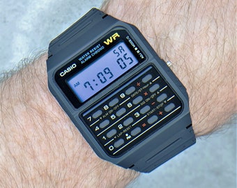 Ripley - RELOJ CASIO CALCULADORA CA-53WF-4B DIGITAL - ROJO