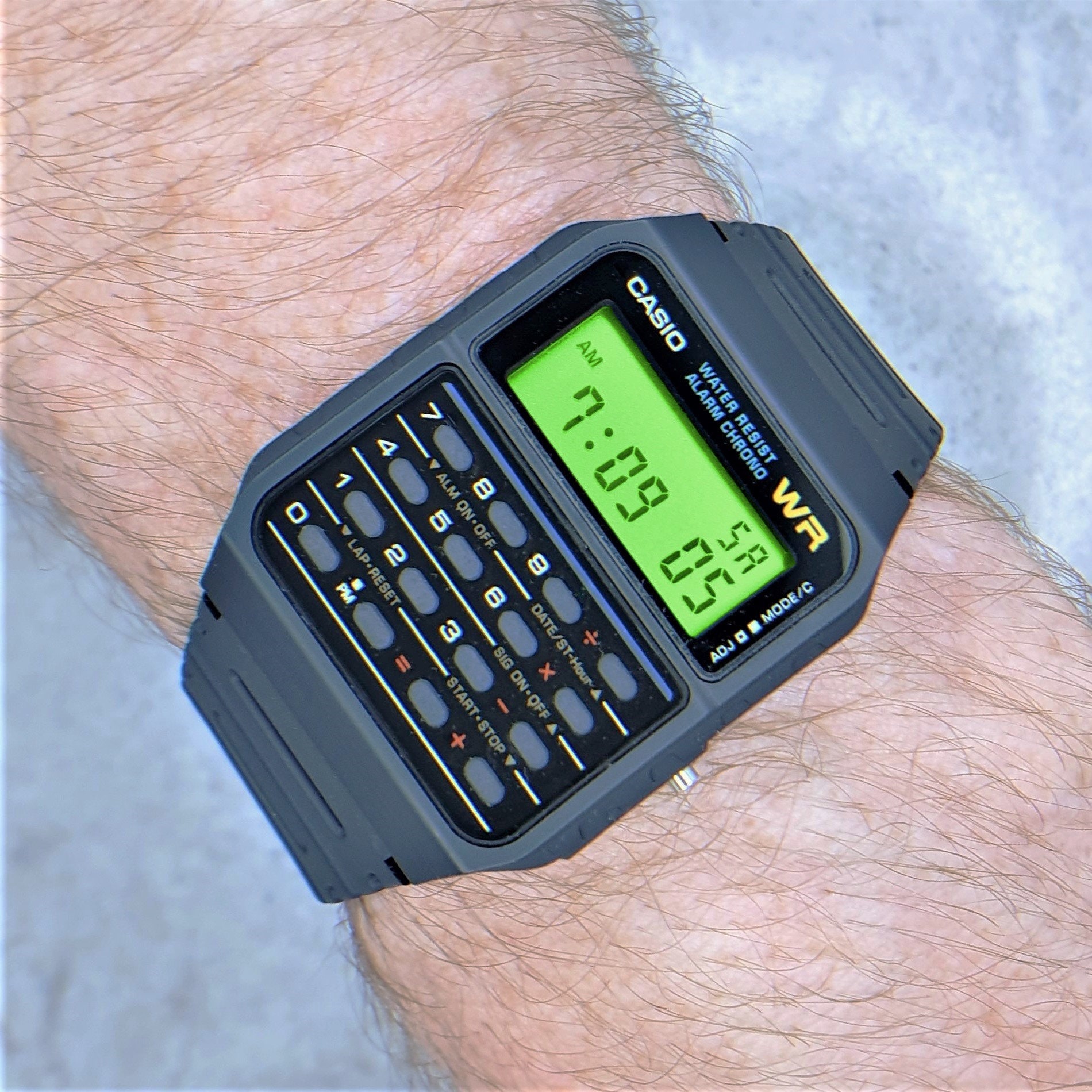 Casio calculator watch turn off clearance alarm