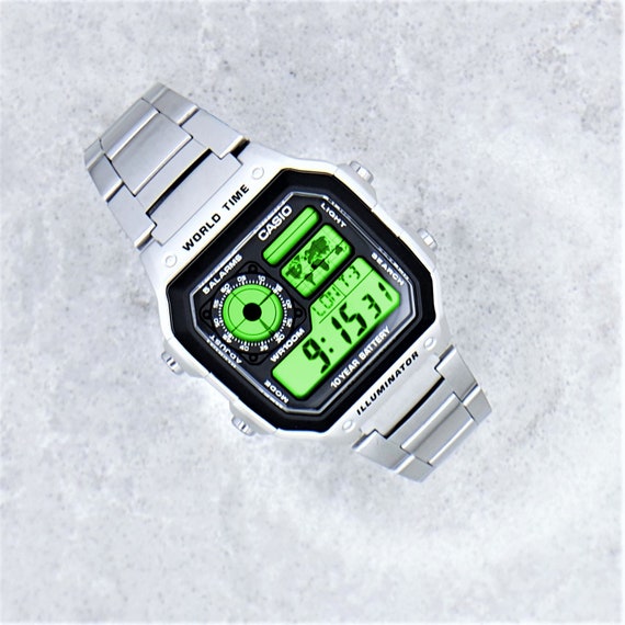 Casio World Time Silver Illuminator Watch with Colour Screen Mod 8 different Colour options AE 1200WHD 1AVEF
