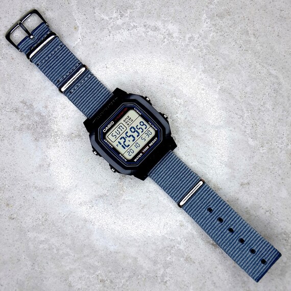 Casio 10 Year Battery Life Watch On A Grey Nylon Nato Strap Etsy Casio 10 Year Battery Life Watch On A Grey Nylon Nato Strap Etsy
