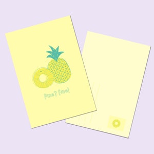 May include: A yellow postcard with a pineapple and a pineapple ring on the front. The text on the postcard reads "Pine? Fine!"