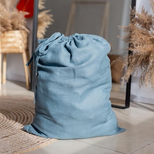 Deep Ocean Blue Linen Laundry bag with hanging tab. Zero-waste large laundry hamper.