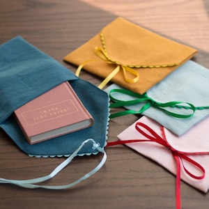 Linen pouches with colorful trim. Elegant Book Wrap and Card Holder. Linen fabric envelope with bow tie.
