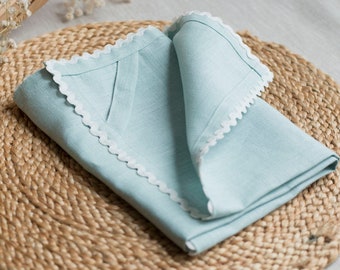 Blue linen tea towel with white rick rack trim. Natural dish kitchen towel.
