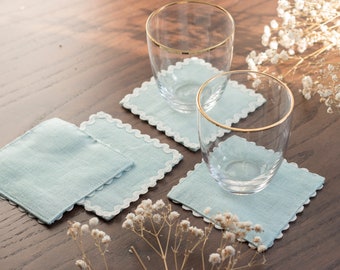 Set of 4 Blue linen cocktail napkins with white rick rack trim. Square cloth cup coaster. Coffee table decor.
