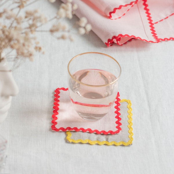 Set of 4 pink linen cocktail napkins with red rick rack trim. Square cloth cup coaster. Coffee table decor.