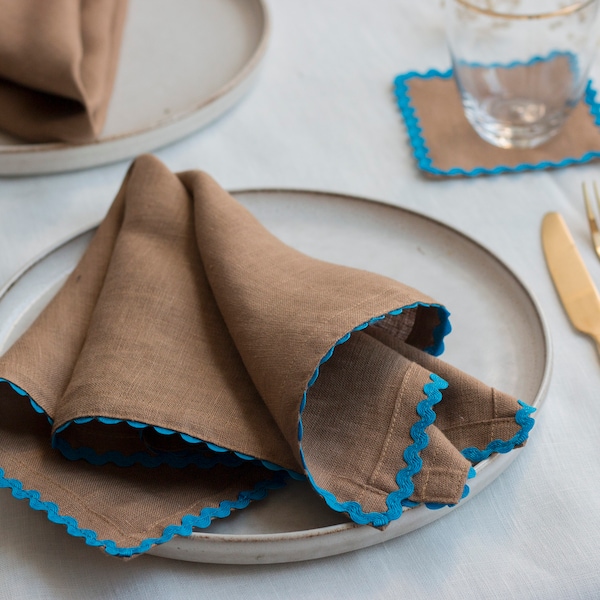 Caramel brown linen dinner napkin with royal blue rick rack trim. Classic table decor. Anniversary gift.
